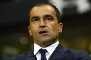 Everton manager Roberto Martinez watches before their English Premier League soccer match against Tottenham Hotspur at White Hart Lane in London