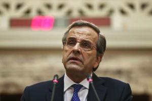 Greece"s Prime Minister and leader of ruling conservative New Democracy party Antonis Samaras addresses his parliamentary group in Athens